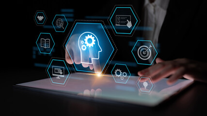 Head with gear and icons representing learning, digital training, and development process, showing...