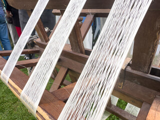 cocoons of white silkworms bred to produce silk , raw silk