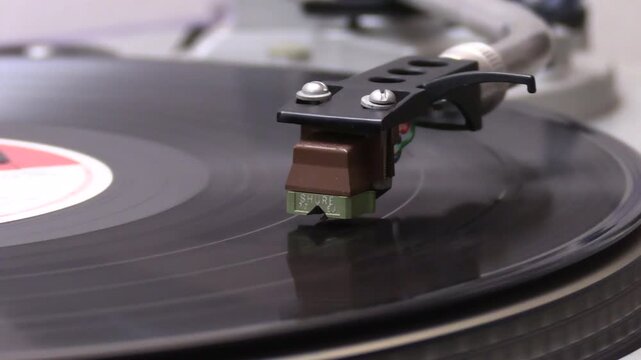 Turntable and cartridge from 1981. Vinyl record.