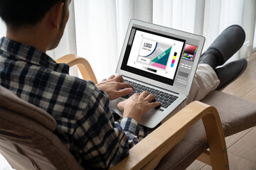 Graphic designer software for modern design of web page and commercial ads showing on the computer screen