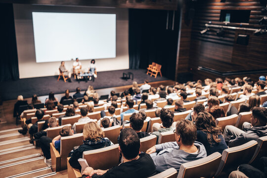 Interview and round table discussion at business convention and presentation. Audience at the conference hall. Business and entrepreneurship symposium. - Powered by Adobe