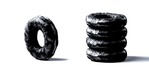 Various sizes of donuts displayed together on a clean background in lighting