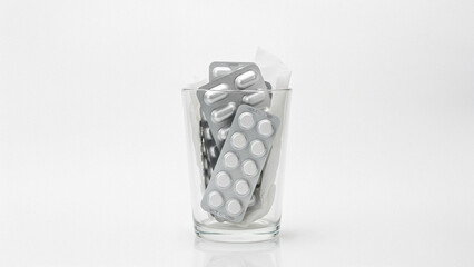 Medical Pills and Tissues in Glass for Cold or Flu Treatment