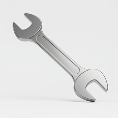 Polished chrome open-end wrench tool casting a subtle shadow on a clean white studio background highlighting its metallic texture and industrial