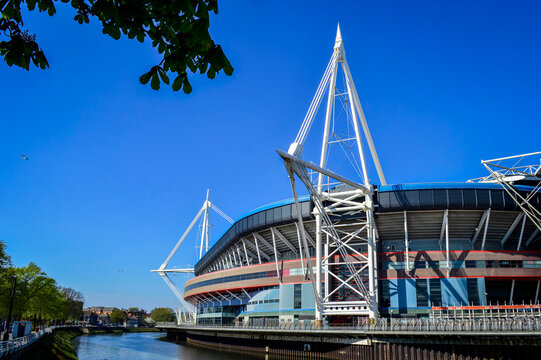 Cardiff, United Kingdom, April 21, 2019. External view of Cardiff Millennium Stadium and River Taff in a sunny day.
