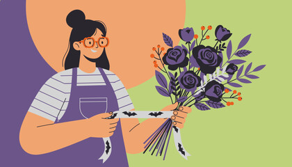 Obraz premium Creative woman designs a unique Halloween floral arrangement with dark flowers and batthemed ribbon
