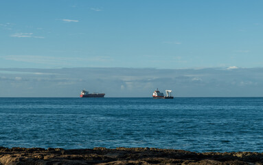 Scenic west Oahu vista at sunrise with ships in the background, Hawaii