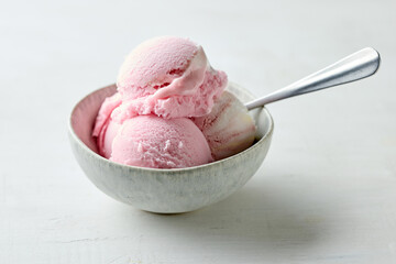 bowl of pink raspberry ice cream