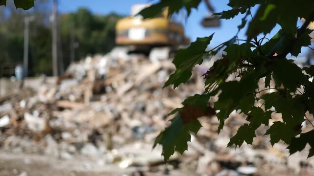 Cinematic Filler Shot of Building Rubble with Excavator