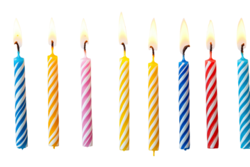 Row of striped birthday candles, each lit with a bright flame