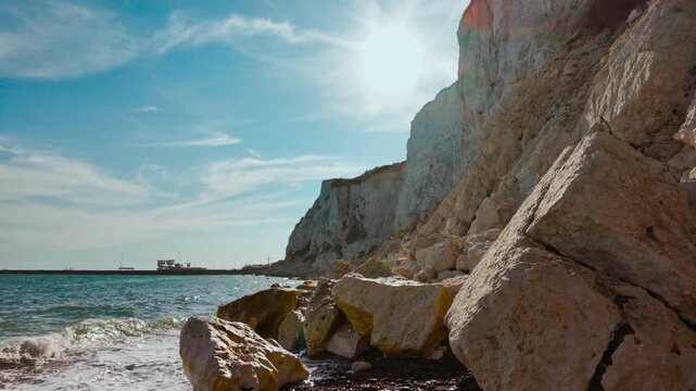 Langdon Beach, White Cliffs of Dover, England, UK, with pebbled shore, chalk cliffs and clear water along a quiet cove