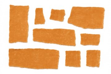 Orange torn paper fragments with rough, natural edges. A versatile vintage paper texture element with transparent background