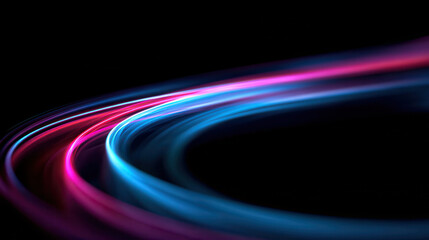 Abstract swirling blue and pink light trails on black background