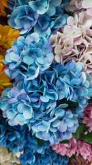 roses, peonies, hydrangeas, designer composition of artificial flowers, floral background in retro style
