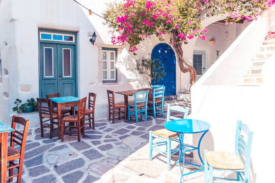 Fototapeta Small greek island cafe courtyard.