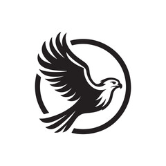 Fototapeta premium Black silhouette of a soaring eagle within a circular emblem