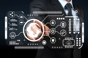 Businessman Interacting with Digital Interface Displaying Global Technology Concepts, Data Analytics, and Cybersecurity Elements in Futuristic Setting