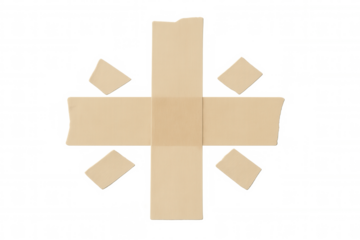 Masking tape pieces forming a cross and asterisk element, sticky beige adhesive strips creating a design on transparent background