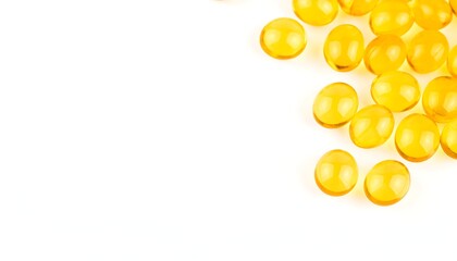 Yellow capsules on white background