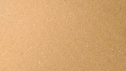 Abstract pattern of beige rough carton, old paper sheet, Background of brown kraft paper or cardboard texture. 