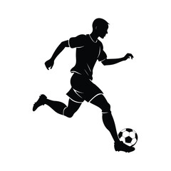 Silhouette of a soccer player kicking a ball football