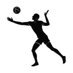 Silhouette of a volleyball player serving the ball