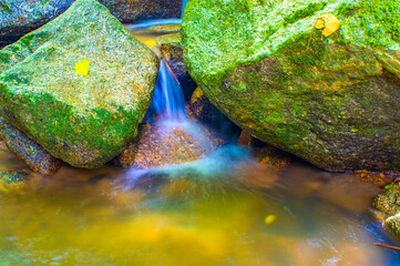 Water Flowing in the forest Waterfall, Thailand.