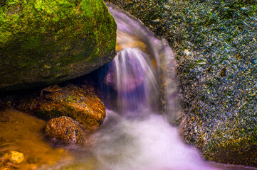Water Flowing in the forest Waterfall, Thailand.
