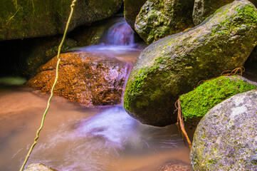 Water Flowing in the forest Waterfall, Thailand.