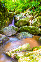 Water Flowing in the forest Waterfall, Thailand.