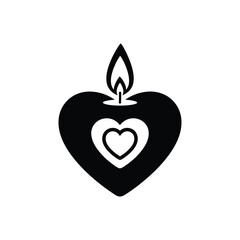 Black heart shaped candle with flame and inner hearts