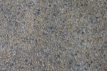Exposed aggregate concrete decorative textured surface with natural stone finish