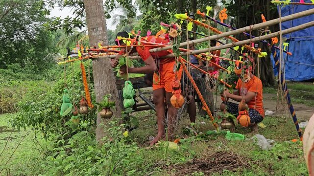 Authentic footage of Hindu devotees carrying beautifully decorated Kanwar Kawad during the sacred Shravan Somwar Sawan Monday pilgrimage in India. Dressed in saffron attire