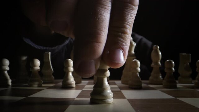 Minimalist Concept of a Chess Duel Making First Move on Dark Background Showing Tactical Foresight, Patience, Mental Concentration, Analytical Thinking, and Symbolic Representation of Planning and
