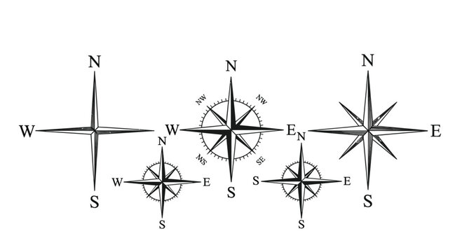 Collection of vintage hand drawn compasses and directional roses
