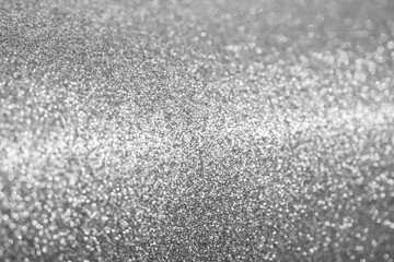 Abstract silver glitter sparkle texture with bokeh background