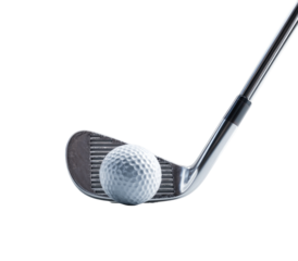 Golf club's metal head poised over a white golf ball, ready to strike