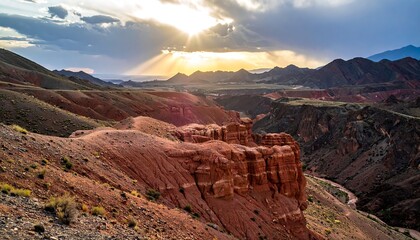 Sunlit canyon landscape with red rock formations and dramatic sky