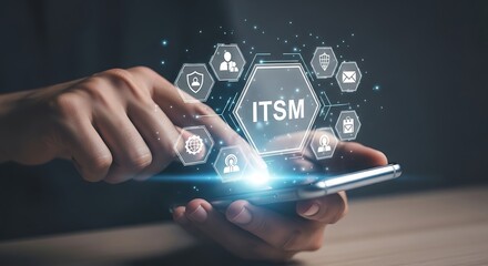 Finger touching ITSM icon on smartphone screen ITSM