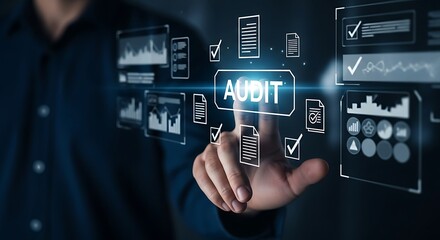 Finger touching ' AUDIT' button on futuristic digital interface