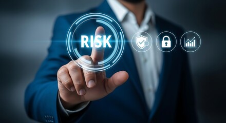 Businessman touching a digital screen displaying the word RISK