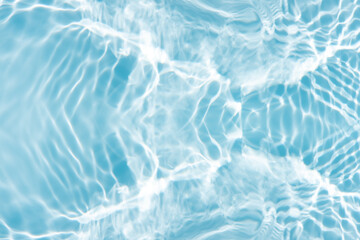 Blue water with ripples on the surface. Defocus blurred transparent blue colored clear calm water...