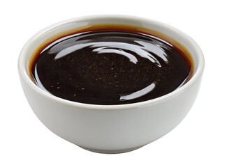 Dark brown sauce in a small, white bowl