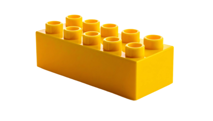Yellow plastic brick with eight studs on a black background