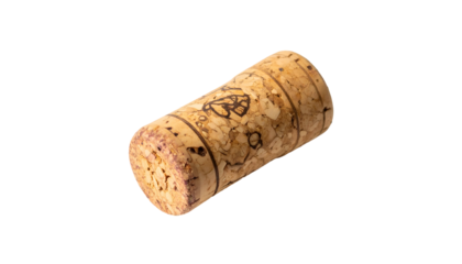 Light brown wine cork with stamp detail, against a black backdrop