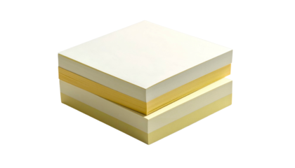 Stacked yellow and white square papers on a solid dark surface