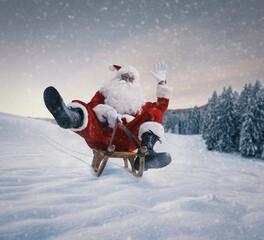 Santa Claus riding a small sleigh