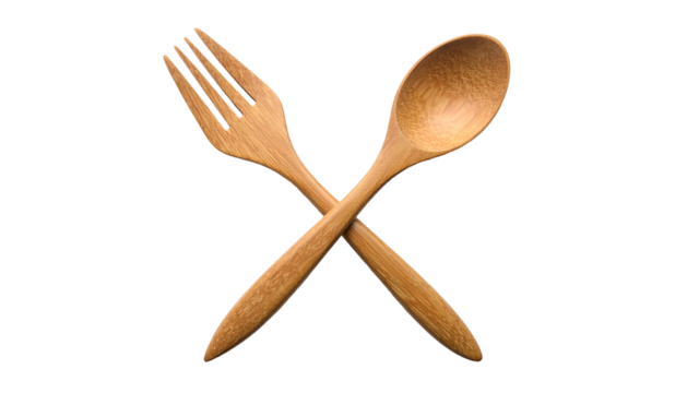 Wooden fork and spoon crossed on a black backdrop