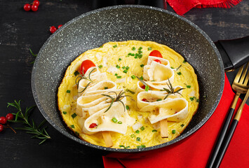 Omelette with pita bread and cheese in the shape of a Christmas tree. Healthy breakfast.