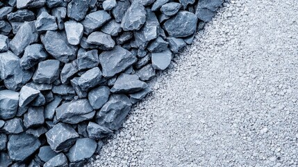 A close-up view of contrasting textures: dark rocks and fine gravel, showcasing the natural beauty of mineral materials.